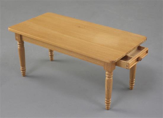Denis Hillman. A Victorian style miniature kitchen dining table, the top 5.5in. x 2 7/8in.